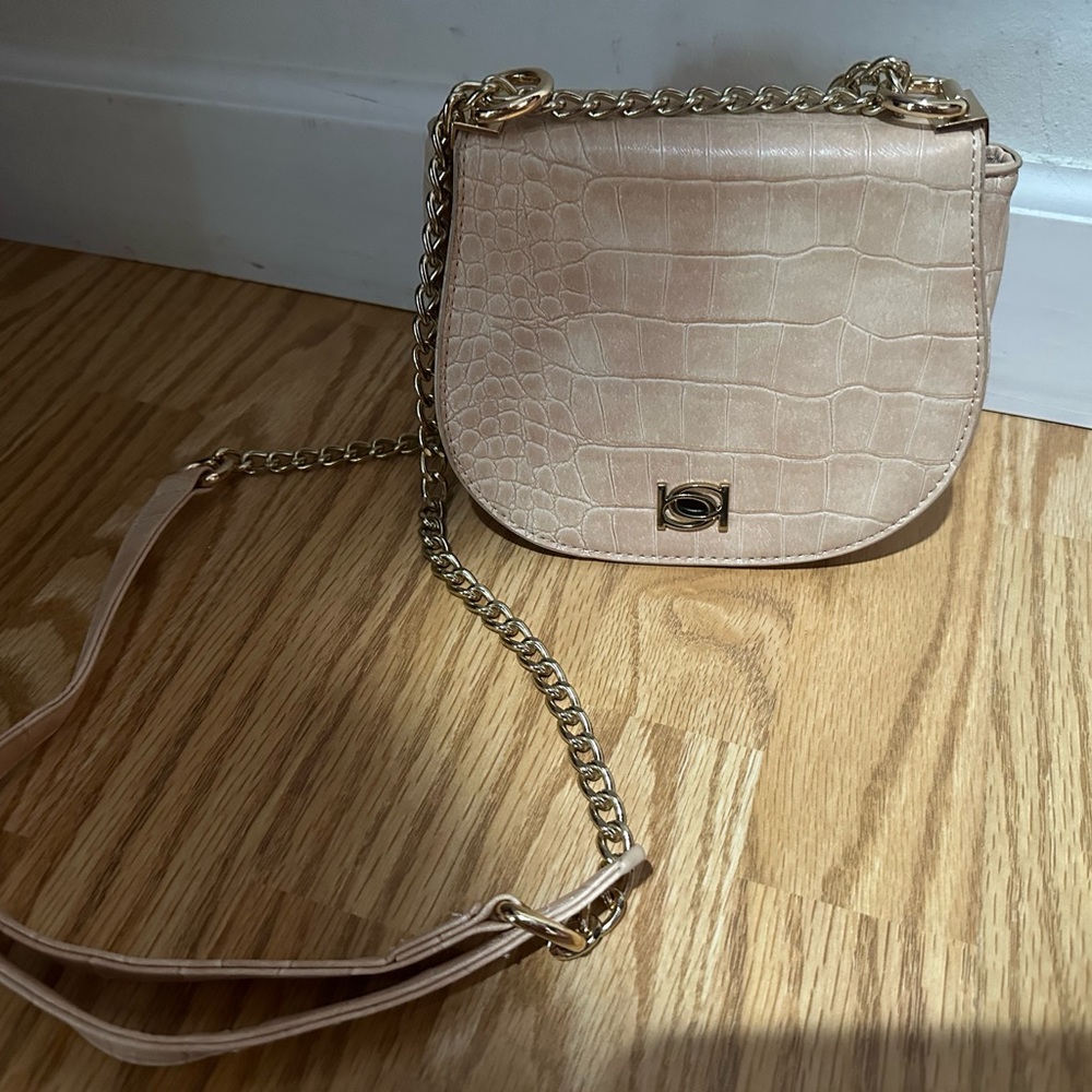 Bebe light pink crossbody bag with chain strap! Looks like crocodile skin.